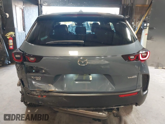 2023 Mazda CX-50 S Premium Plus with VIN 7MMVABEM3PN108555, listed as a IAAI auction lot 41202257 with 21,258 mi miles and . Bid and sale history available at DreamBid. Image 16.