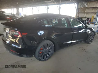 2021 Tesla Model 3 Performance with VIN 5YJ3E1EC0MF060360, listed as a Copart auction lot 43315195 with 28,726 mi miles and Salvage Title. Bid and sale history available at DreamBid. Image 3.