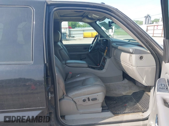 2005 Cadillac Escalade z VIN 1GYEK63N85R238220, wystawiony jako IAAI lot #42498575 z przebiegiem 229 529 mil mil oraz . Historia ofert i sprzedaży dostępna na DreamBid. Obrazek 5.