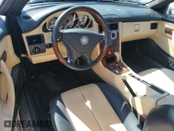 2003 Mercedes-Benz SLK 320 with VIN WDBKK65F03F286130, listed as a Copart auction lot 61544385 with 98,899 mi miles and Salvage title. Bid and sale history available at DreamBid. Image 8.