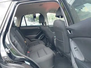 2016 Mazda CX-5 Touring with VIN JM3KE2CY5G0653108, listed as a IAAI auction lot 37717249 with 90,704 mi miles and . Bid and sale history available at DreamBid. Image 8.