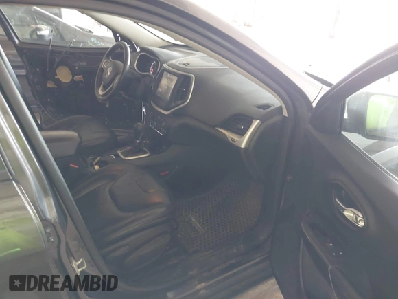2016 Jeep Cherokee Trailhawk with VIN 1C4PJMBS0GW169184, listed as a IAAI auction lot 42255346 with 152,802 mi miles and . Bid and sale history available at DreamBid. Image 5.