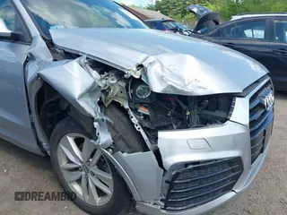 2018 Audi Q3 Premium with VIN WA1ECCFS0JR022112, listed as a IAAI auction lot 42356014 with 56,671 mi miles and . Bid and sale history available at DreamBid. Image 6.