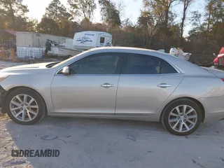 2014 Chevrolet Malibu LTZ with VIN 1G11H5SL9EF299826, listed as a IAAI auction lot 40955208 with 213,203 mi miles and . Bid and sale history available at DreamBid. Image 14.