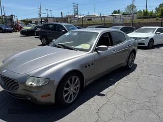 2006 Maserati Quattroporte z VIN ZAMCE39A960021168, wystawiony jako Copart lot #56921785 z przebiegiem 54 505 mil mil oraz Tytuł czysty. Historia ofert i sprzedaży dostępna na DreamBid. Obrazek 2.