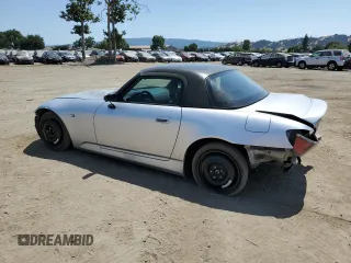 2002 Honda S2000 z VIN JHMAP11442T000235, wystawiony jako Copart lot #59429155 z przebiegiem 142 845 mil mil oraz Szkoda całkowita • Salvage title. Historia ofert i sprzedaży dostępna na DreamBid. Obrazek 2.