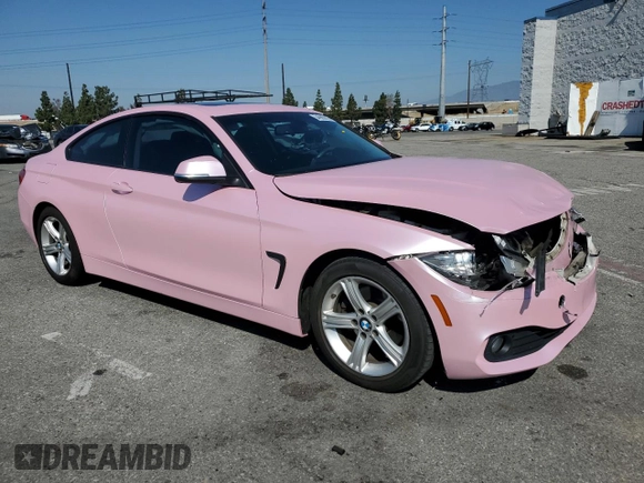 2015 BMW 4 Series 428i with VIN WBA3N7C58FK223086, listed as a Copart auction lot 54985015 with 115,857 mi miles and Salvage Title. Bid and sale history available at DreamBid. Image 4.