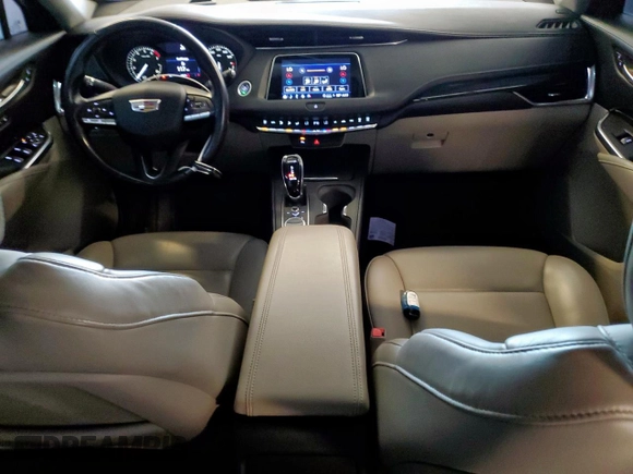 2022 Cadillac XT4 FWD Premium Luxury with VIN 1GYFZCR47NF100232, listed as a Copart auction lot 54520405 with 68,819 mi miles and Clean title. Bid and sale history available at DreamBid. Image 8.