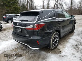 2021 Lexus RX with VIN JTJHZKFA4M2031523, listed as a Copart auction lot 38272653 with 10,575 mi miles. Bid and sale history available at carsss.com. Image 3.