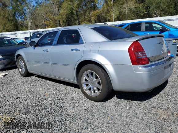 2005 Chrysler 300 with VIN 2C3AA63H95H657666, listed as a Copart auction lot 47989065 with 195,184 mi miles and Salvage Title. Bid and sale history available at carsss.com. Image 2.