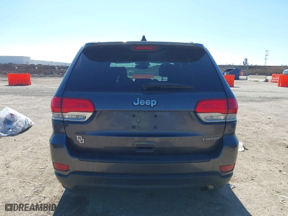 2014 Jeep Grand Cherokee Laredo with VIN 1C4RJEAG4EC317072, listed as a IAAI auction lot 41476862 with 127,742 mi miles. Bid and sale history available at carsss.com. Image 17.