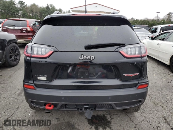 2022 Jeep Cherokee Trailhawk with VIN 1C4PJMBX3ND502322, listed as a Copart auction lot 85561444 with 57,630 mi miles and Salvage Title. Bid and sale history available at carsss.com. Image 6.