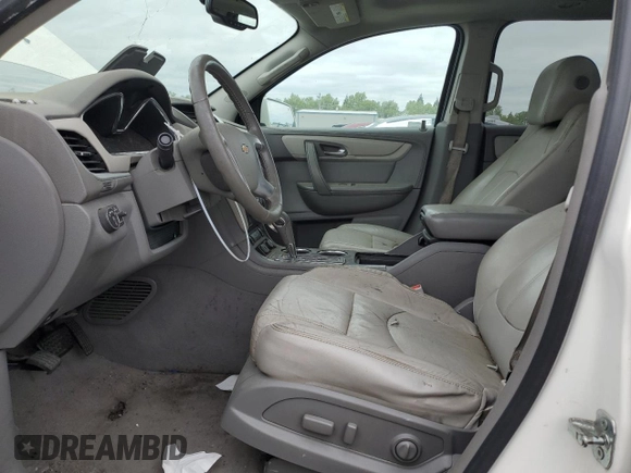 2015 Chevrolet Traverse LT z VIN 1GNKVHKD0FJ321197, wystawiony jako Copart lot #53737015 z przebiegiem Nie podano mil oraz Czysty tytuł • Clean title. Historia ofert i sprzedaży dostępna na DreamBid. Obrazek 7.