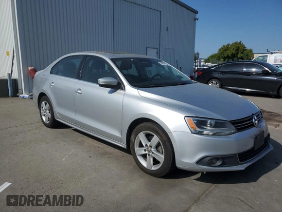 2012 Volkswagen Jetta TDI w/Premium & Nav with VIN 3VWLL7AJ8CM349006, listed as a Copart auction lot 54934995 with 110,596 mi miles and Salvage title. Bid and sale history available at DreamBid. Image 4.