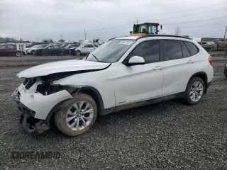 2014 BMW X1 xDrive28i z VIN WBAVL1C50EVY12349, wystawiony jako Copart lot #50647105 z przebiegiem 130 901 mil mil oraz Szkoda całkowita • Salvage title. Historia ofert i sprzedaży dostępna na DreamBid. Obrazek 1.