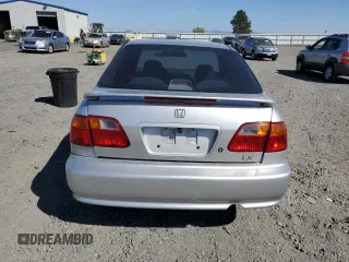 1999 Honda Civic LX with VIN 1HGEJ6676XL012089, listed as a Copart auction lot 69780554 with 161,684 mi miles and Clean Title. Bid and sale history available at carsss.com. Image 6.