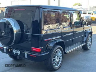 2023 Mercedes-Benz G 550 with VIN W1NYC6BJ6PX474872, listed as a Copart auction lot 74717934 with 18,299 mi miles and Clean Title. Bid and sale history available at DreamBid. Image 4.