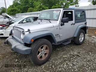2008 Jeep Wrangler X z VIN 1J4FA24168L629174, wystawiony jako Copart lot #61199205 z przebiegiem 116 307 mil mil oraz Szkoda całkowita • Salvage title. Historia ofert i sprzedaży dostępna na DreamBid. Obrazek 1.