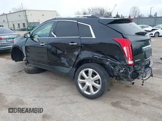 2015 Cadillac SRX Premium Collection with VIN 3GYFNGE37FS556860, listed as a IAAI auction lot 41854634 with 170,808 mi miles and . Bid and sale history available at DreamBid. Image 3.