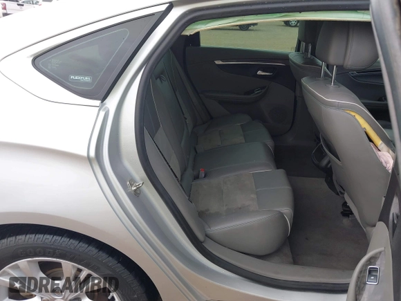2014 Chevrolet Impala LT with VIN 2G1125S38E9102607, listed as a IAAI auction lot 41860235 with 128,599 mi miles and . Bid and sale history available at DreamBid. Image 8.