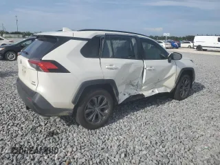 2022 Toyota RAV4 Hybrid XLE Premium with VIN JTMB6RFV4ND535282, listed as a Copart auction lot 61249445 with 82,398 mi miles and Salvage title. Bid and sale history available at DreamBid. Image 3.
