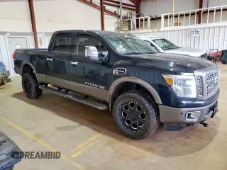2016 Nissan Titan Pro-4X with VIN 1N6BA1F44GN509606, listed as a Copart auction lot 62336625 with 258,040 mi miles and Salvage title. Bid and sale history available at DreamBid. Image 4.
