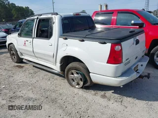 2005 Ford Explorer Sport Trac XLS z VIN 1FMZU67K15UA48284, wystawiony jako IAAI lot #41430056 z przebiegiem 279 584 mil mil oraz . Historia ofert i sprzedaży dostępna na DreamBid. Obrazek 3.