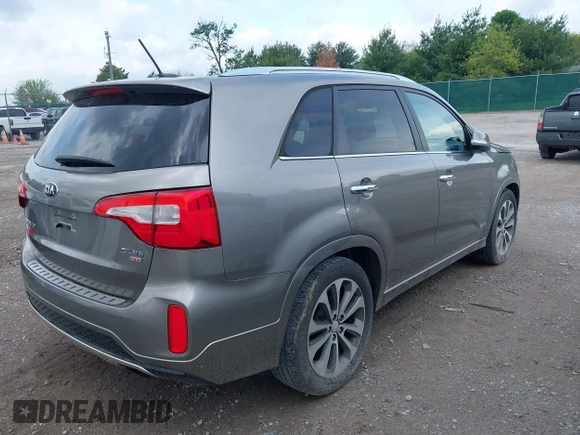 2014 Kia Sorento SX with VIN 5XYKWDA72EG518235, listed as a IAAI auction lot 42165235 with 131,603 mi miles. Bid and sale history available at carsss.com. Image 4.