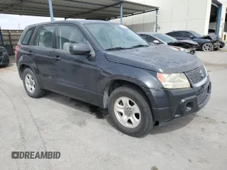 2012 Suzuki Grand Vitara z VIN JS3TE0D59C4100035, wystawiony jako Copart lot #51780435 z przebiegiem 49 620 mil mil oraz Czysty tytuł • Clean title. Historia ofert i sprzedaży dostępna na DreamBid. Obrazek 4.