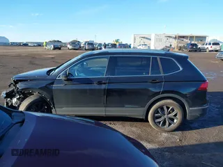 2023 Volkswagen Tiguan SE with VIN 3VVMB7AX8PM032557, listed as a IAAI auction lot 41585975 with 28,706 mi miles and . Bid and sale history available at DreamBid. Image 14.