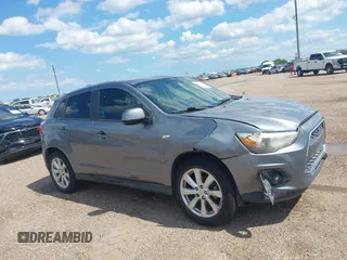 2015 Mitsubishi Outlander ES z VIN 4A4AP3AUXFE026547, wystawiony jako IAAI lot #42223662 z przebiegiem 155 990 mil mil oraz . Historia ofert i sprzedaży dostępna na DreamBid. Obrazek 13.