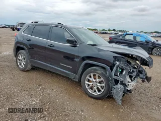 2016 Jeep Cherokee Latitude with VIN 1C4PJLCB2GW302486, listed as a Copart auction lot 60652285 with 113,875 mi miles and Salvage title. Bid and sale history available at DreamBid. Image 4.