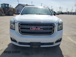 2016 GMC Yukon XL SLT with VIN 1GKS2GKC6GR228033, listed as a Copart auction lot 52450055 with 135,476 mi miles and Salvage Title. Bid and sale history available at DreamBid. Image 5.