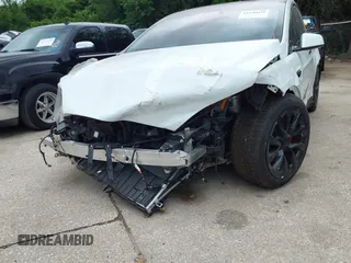 2024 Tesla Model X Plaid with VIN 7SAXCBE63RF440245, listed as a IAAI auction lot 42140051 with Not Provided miles and . Bid and sale history available at carsss.com. Image 6.