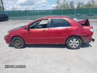 2005 Toyota Corolla CE with VIN 1NXBR32E55Z411298, listed as a IAAI auction lot 42082065 with 220,695 mi miles. Bid and sale history available at carsss.com. Image 15.