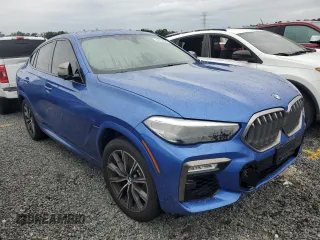 2020 BMW X6 M50i with VIN 5UXCY8C02L9B20285, listed as a Copart auction lot 74127524 with 0 mi miles and Non Repairable. Bid and sale history available at carsss.com. Image 4.