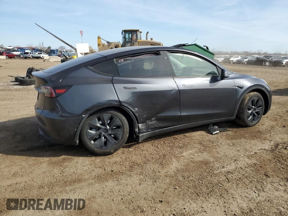 2024 Tesla Model Y with VIN 7SAYGDED7RF163537, listed as a Copart auction lot 48639255 with 7,193 mi miles and Salvage Title. Bid and sale history available at DreamBid. Image 3.