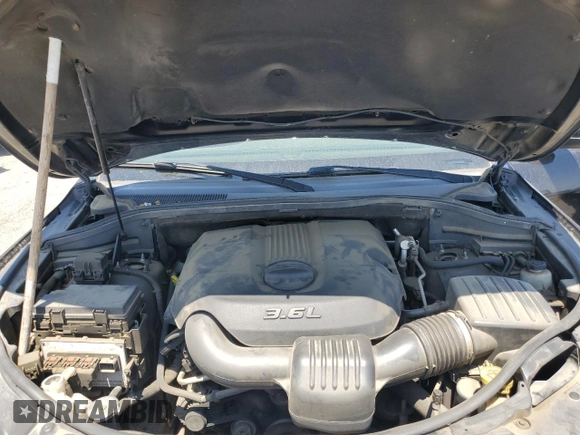 2011 Jeep Grand Cherokee Laredo with VIN 1J4RR4GG0BC563603, listed as a Copart auction lot 60237475 with 243,885 mi miles and Salvage title. Bid and sale history available at DreamBid. Image 12.