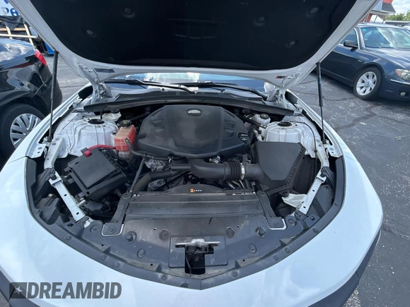 2021 Chevrolet Camaro 1LT with VIN 1G1FB1RS0M0109877, listed as a Copart auction lot 57296035 with 26,486 mi miles and Salvage title. Bid and sale history available at DreamBid. Image 7.
