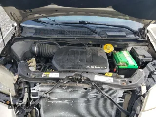 2013 Dodge Grand Caravan SE with VIN 2C4RDGBG2DR791593, listed as a Copart auction lot 51997165 with 84,959 mi miles and Salvage Title. Bid and sale history available at DreamBid. Image 12.