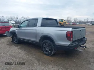 2020 Honda Ridgeline Sport with VIN 5FPYK3F13LB023123, listed as a IAAI auction lot 41694273 with 51,934 mi miles and . Bid and sale history available at DreamBid. Image 3.