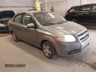 2011 Chevrolet Aveo 1LT with VIN KL1TD5DE5BB198819, listed as a IAAI auction lot 41992498 with 156,145 mi miles and . Bid and sale history available at DreamBid. Image 1.