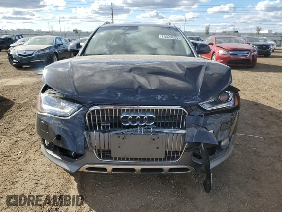 2014 Audi allroad Premium Plus with VIN WA1UFAFL0EA131822, listed as a Copart auction lot 76324684 with 73,048 mi miles and Salvage Title. Bid and sale history available at carsss.com. Image 5.