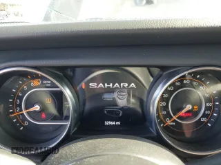 2022 Jeep Wrangler Unlimited Sahara z VIN 1C4HJXEN0NW110192, wystawiony jako Copart lot #57206625 z przebiegiem 32 964 mil mil oraz Szkoda całkowita • Salvage title. Historia ofert i sprzedaży dostępna na DreamBid. Obrazek 9.