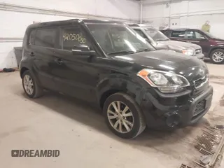 2012 Kia Soul + with VIN KNDJT2A60C7457882, listed as a IAAI auction lot 42050050 with 153,560 mi miles. Bid and sale history available at carsss.com. Image 1.