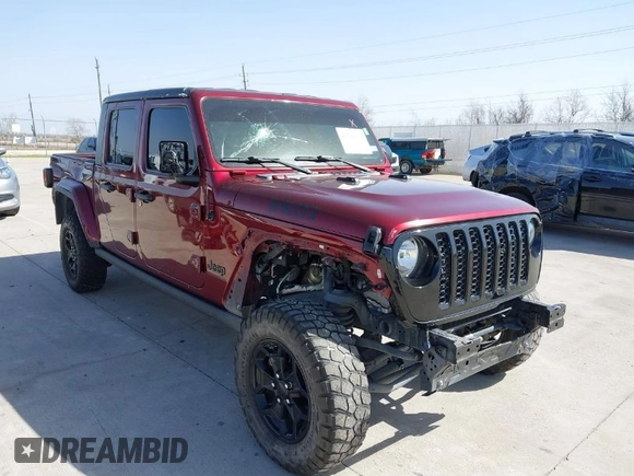 2021 Jeep Gladiator Willys z VIN 1C6HJTAG0ML536455, wystawiony jako IAAI lot #41702393 z przebiegiem 90 644 mil mil oraz . Historia ofert i sprzedaży dostępna na DreamBid. Obrazek 1.