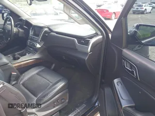 2015 Chevrolet Tahoe LT with VIN 1GNSCBKC1FR615817, listed as a IAAI auction lot 41760474 with 242,148 mi miles and . Bid and sale history available at DreamBid. Image 5.