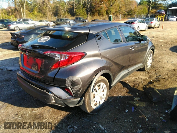 2019 Toyota C-HR XLE with VIN JTNKHMBX3K1034591, listed as a IAAI auction lot 40971538 with 135,200 mi miles. Bid and sale history available at carsss.com. Image 4.