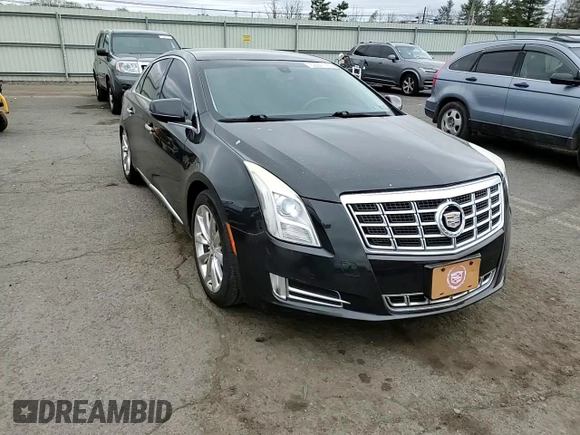 2013 Cadillac XTS Luxury z VIN 2G61R5S37D9127597, wystawiony jako Copart lot #53841755 z przebiegiem 81 603 mil mil oraz Szkoda całkowita • Salvage title. Historia ofert i sprzedaży dostępna na DreamBid. Obrazek 13.