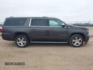 2017 Chevrolet Suburban Premier with VIN 1GNSKJKC3HR201180, listed as a IAAI auction lot 41516652 with Not Provided miles and . Bid and sale history available at DreamBid. Image 13.